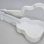 Cutie in forma de chitara